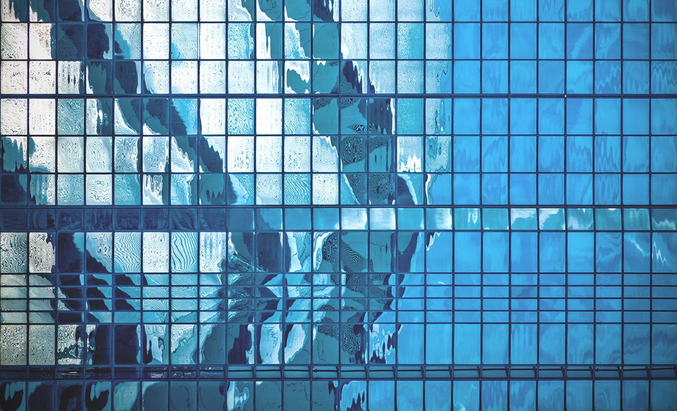 Architecture Abstract Of A Contemporary Opera House Reflected In A Modern Glass Office Block With Copy Space