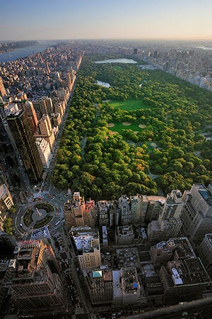Aerial view of Central Park and Columbus Circle, Manhattan, New York; Park is surrounded by skyscraper