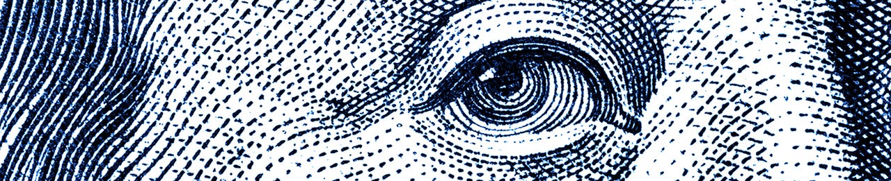Portrait fragment of Benjamin Franklin close-up from one hundred dollars bill